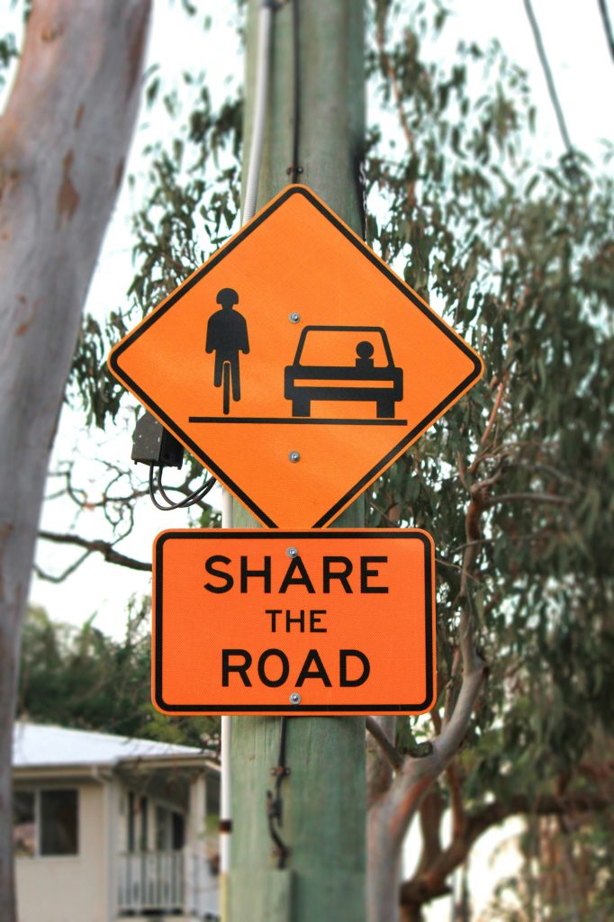 Road safety sign indicating vehicles are to share the road with cyclists